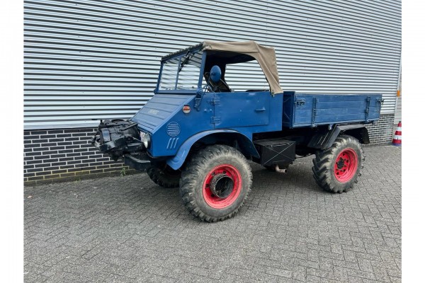 Mercedes-Benz Unimog 411 Bosbouw lieren voor en achter